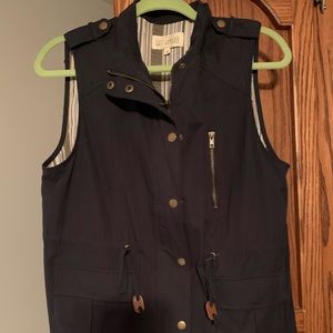 Navy blue light weight vest.